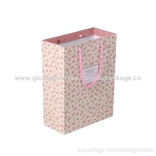 Paper bag with string, quality matte white cardboard and covered